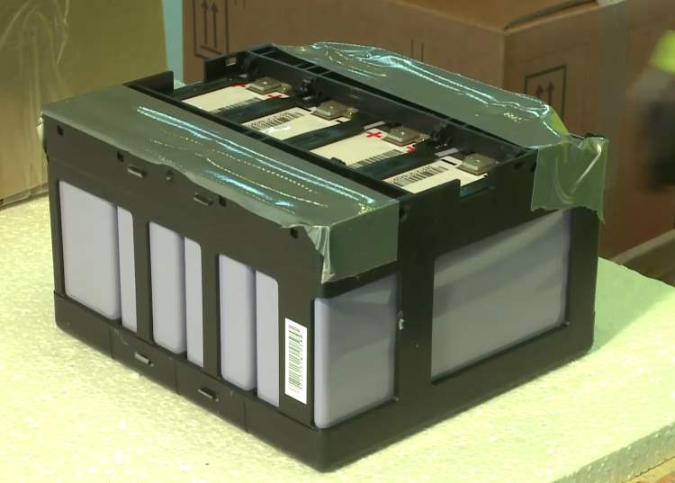 A bigger battery module in a plastic frame.