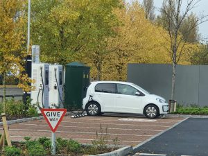 A VW EV charging up on an EVSE charging station in the UK