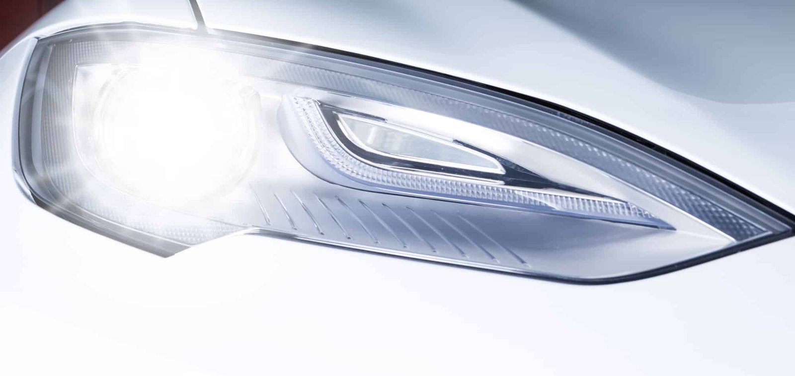 Why Tesla Lights Sometimes Flash On Their Own When Parked Green Car