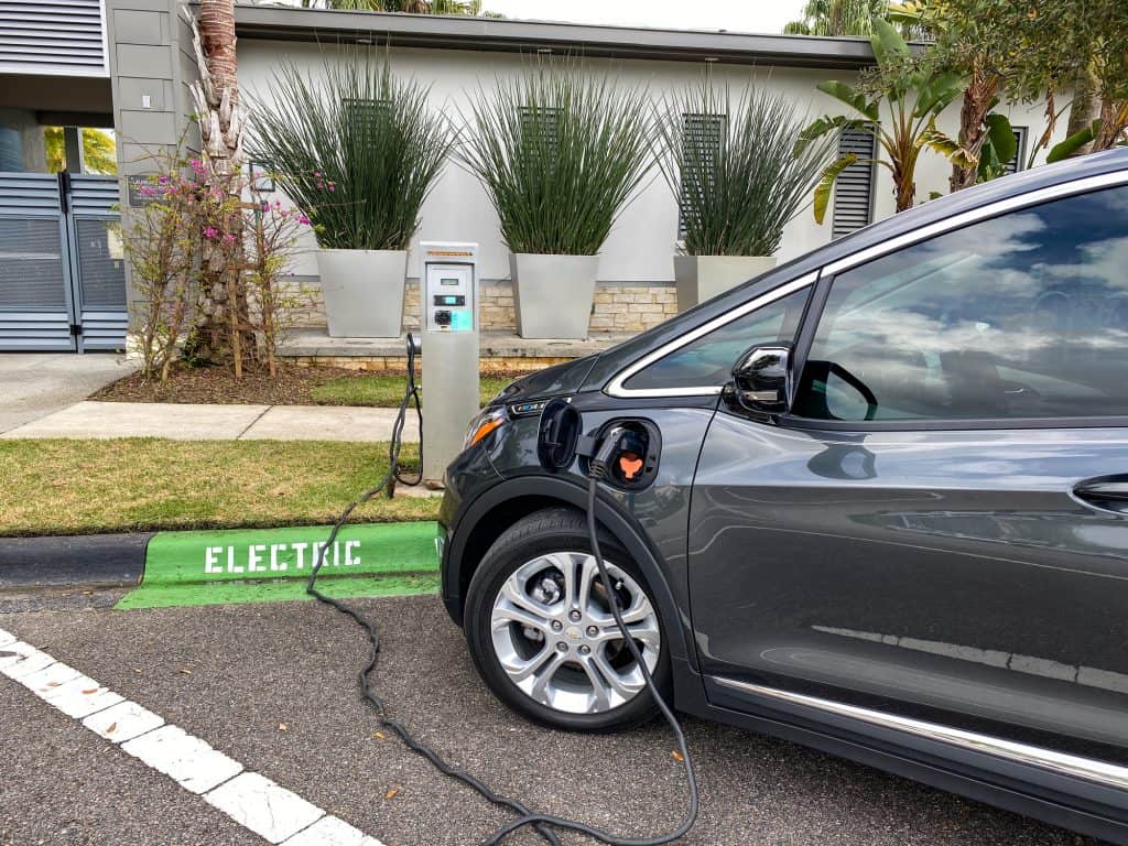 A Chevy Bolt electric vehicle charging at a free public charging station