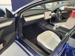 The black and white interior option within a Tesla Model 3