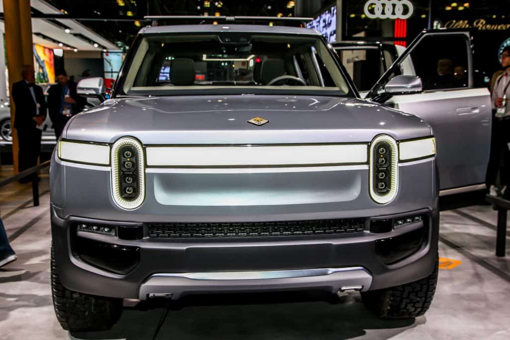 The Rivian R1T Pickup truck at a car show