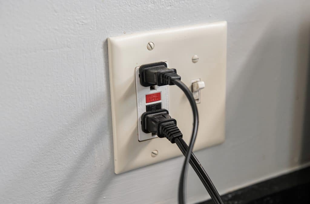 GFI outlet with a reset button